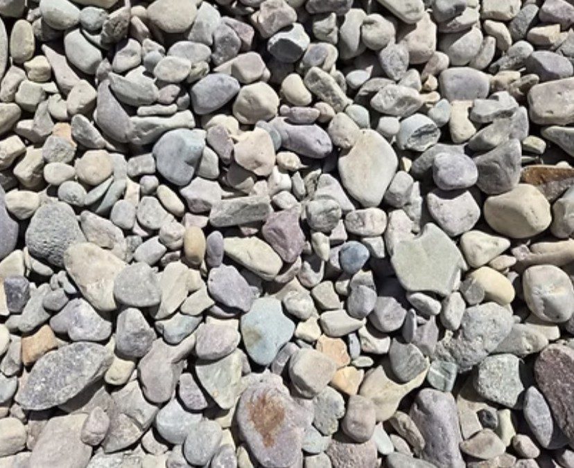 Multicolor Glacier river cobble close up